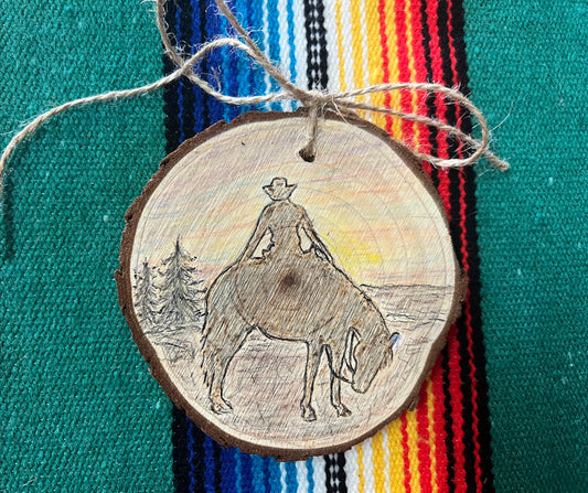Hand Burned Sunset Cowboy Ornament on Wood